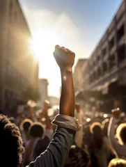 Crédence en verre imprimé Etats Unis African American people in a crowd fighting and protesting in the street with raised fists against racism and racial discrimination, for change, freedom, justice and equality - Black Lives Matter