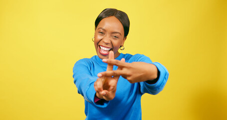 Beautiful Black woman dancing with hashtag symbol, social media campaign yellow