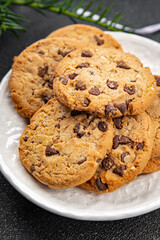 cinnamon cookie chocolate drops christmas sweet dessert holiday treat new year and christmas meal food snack on the table copy space food background rustic top view