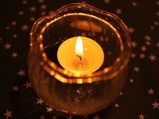 candle in a glass container, Christmas atmosphere