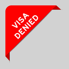 Red color of corner label banner with word visa denied on gray background