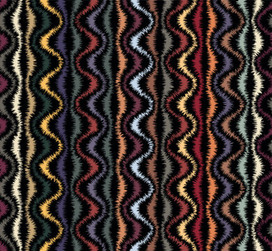 Seamless repeating pattern. Embroidered multicolor wavy stripes on a black background. Geometric striped ornament. Vintage style texture. Vector image.