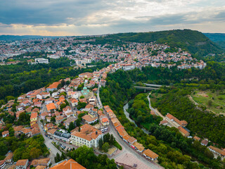 An aerial view of Veliko Tarnovo reveals a Bulgarian city rich in history and culture, with its beautiful buildings, streets, and picturesque hills.