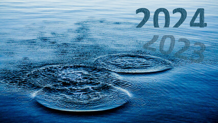 Transition from 2023 to new year concept with 2024 text on sea. Happy New Year 2024 is coming. High resolution photo image can be used as large display, print, website banner, social media post.