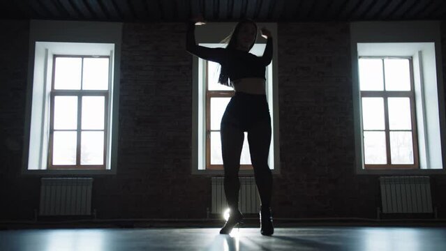 Flexible Woman Dance Opposite Spotlight