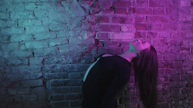  Sexy Young Woman Dancing In Neon Light