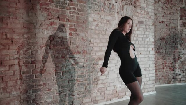 Sexy Flexible Woman Dance in loft studio