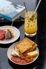 mini cheese board serve with alcoholic beverage