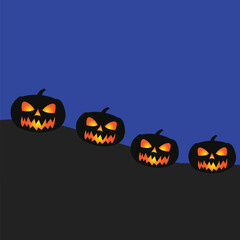 pumpkin silhouette with illuminated eyes on blue color background