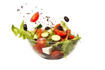 Gordijnen Fresh Greek salad ingredients dropped into bowl on a white background studio shot © JetHuynh