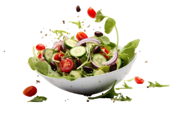 Fotobehang Fresh Greek salad ingredients dropped into bowl on a white background studio shot © JetHuynh