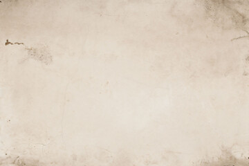 Obraz premium aged concrete wall with a close-up shot, featuring a vintage, plain cream-colored cement wall background texture.retro charm reminiscent of antique parchment paper.