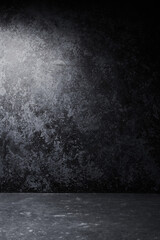 Black abstract textured background with stains and scratches. Wall and floor grunge style