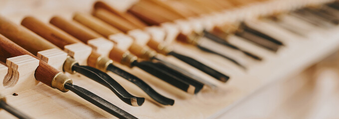 Carpentry workshop, furniture production manufactory, woodworking tools set close-up. - obrazy, fototapety, plakaty