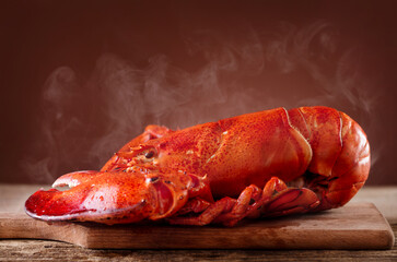 Boiled lobster on wooden background