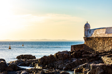 Saint Mary fort on the seafront of the city of Salvador in Bahia during sunset - obrazy, fototapety, plakaty