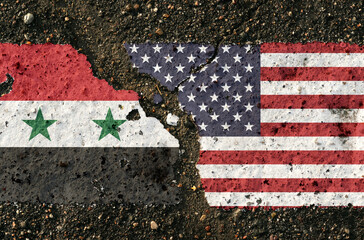 On the pavement are images of the flags of Syria and the United States, as a symbol of...