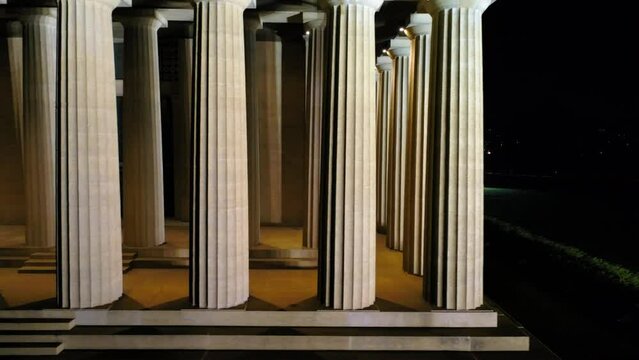 Aerial: Drone Panning Shot Of Illuminated Colonnade In City Against Sky At Night - Nashville, Tennessee
