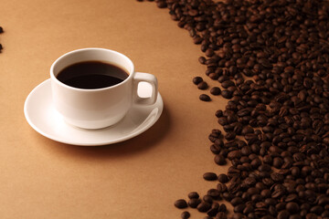 cup of coffee with beans