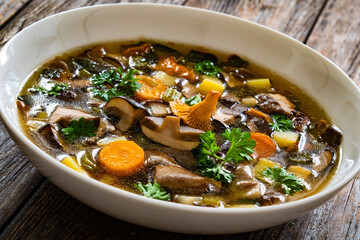 Mushroom soup on wooden table
