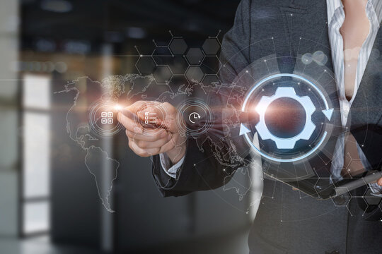 The businesswoman is working on updating the system. - Powered by Adobe