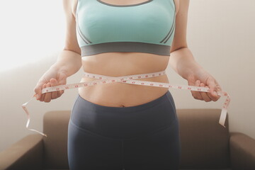 Women body fat belly. Obese woman hand holding excessive belly fat. diet lifestyle concept to...