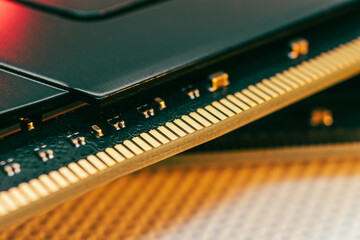 DDR4 DRAM memory golden electrical contact components macro. Computer RAM chip close-up. Desktop PC module parts for assemble