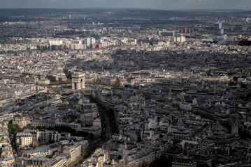 Paris, France - April 3 2019: The arc de triomphe from the eiffel tower over the streets of Paris on a clear day