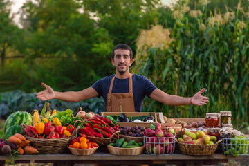 The farmer sells fruits and vegetables at the farmers market. Selective focus.