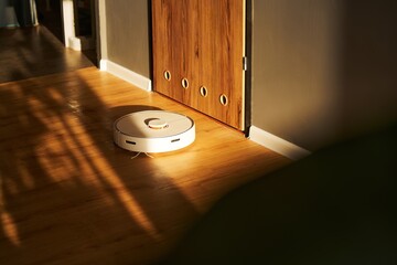 Modern Robotic Vacuum Cleaner for Smart Homes. Effortless Housekeeping. Smart Home Cleaning....