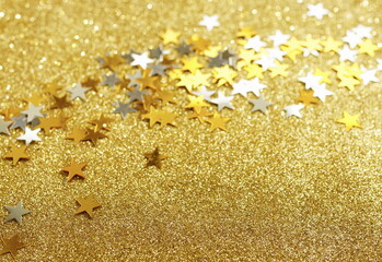 Abstract gold stars sparkle background template banner . Copy space.Christmas blur glitter bokeh gold festive backdrop.