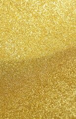 Abstract sparkle background template gold color with copy space.Christmas blur glitter bokeh gold...