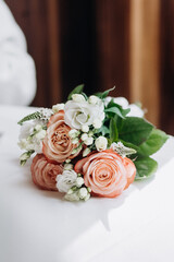 Close-up beautiful bouquet of roses on the table served and decorated dinner