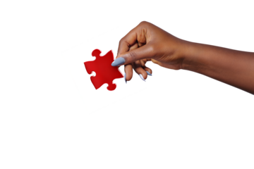 female hand holding with a puzzle piece on free PNG Background.