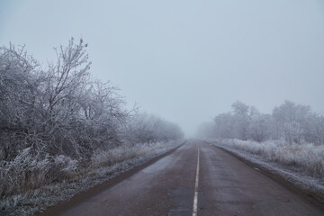 Fototapeta premium Winter Morning on a Lonely Road