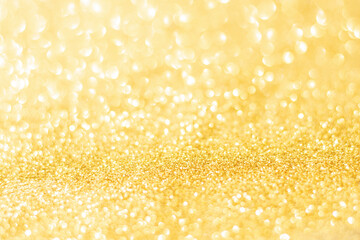 Gold glitter defocused texture background. gold christmas abstract background.