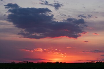 Stunning landscape featuring a vibrant orange and purple sunset