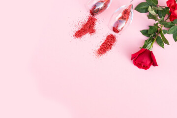 Valentines day background, with rose and glasses of champagne, holiday festive background