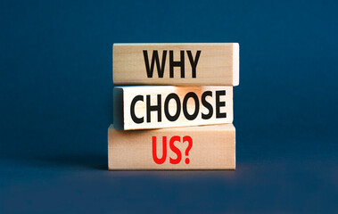 Why choose us symbol. Concept word Why choose us on beautiful wooden block. Beautiful grey table grey background. Business motivational why choose us concept. Copy space.
