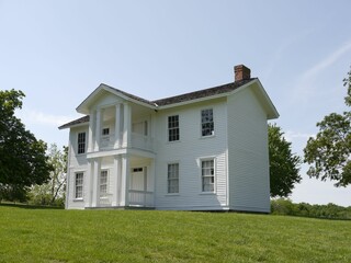 Two-story white house at Missouri Town Living History Museum in Lee's Summit, Missouri