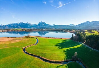 Stunning aerial view of a mountain range in the distant background