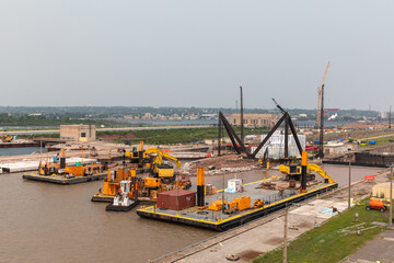 Construction and Dredging Equipment, Heavy Machinery, Working on New Lock at Soo Locks, Adjacent to Poe Lock, St Marys River, Lake Superior - 650883750