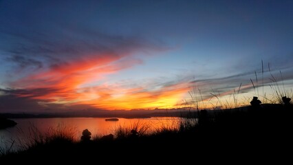 Sunrise in Komdo National Park, Indonesia from Padar island with cairns