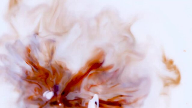 Abstract Ink Movement in white and orange colors