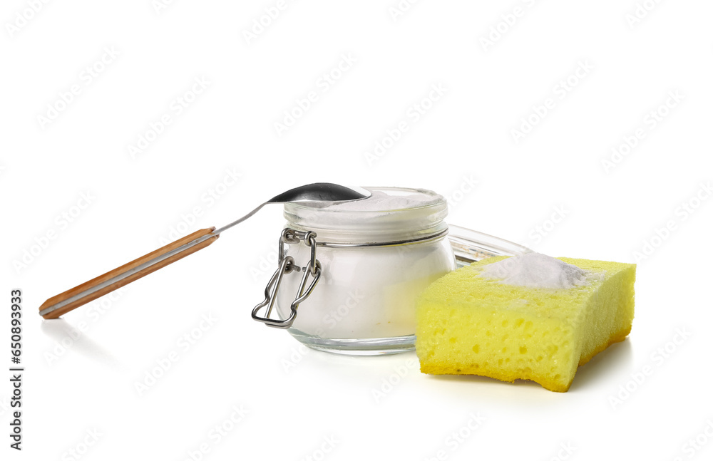 Wall mural jar of baking soda and cleaning sponge on white background