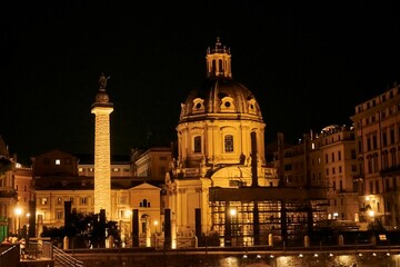 Fototapeta na wymiar Foro Traiano area in Rome, Italy lit up at night in all its glory