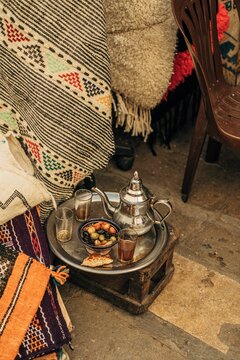 Tray with olives and drinks on it outdoors in the Habous District, Casablanca, Morocco