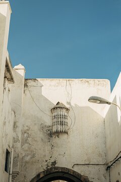 Vertical shot of old dirty buildings in the Habous District, Casablanca, Morocco