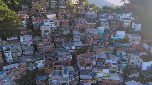 Slow aerial pullback from colourful favela houses in Rio de Janeiro, Brazil