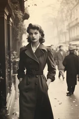 Selbstklebende Fototapeten woman walking through Paris in 1950, vintage monochromatic © Jorge Ferreiro